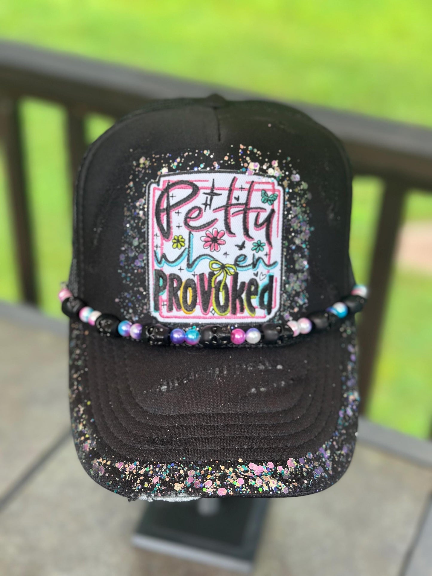 Petty When Provoked destructed black hand painted trucker hat.