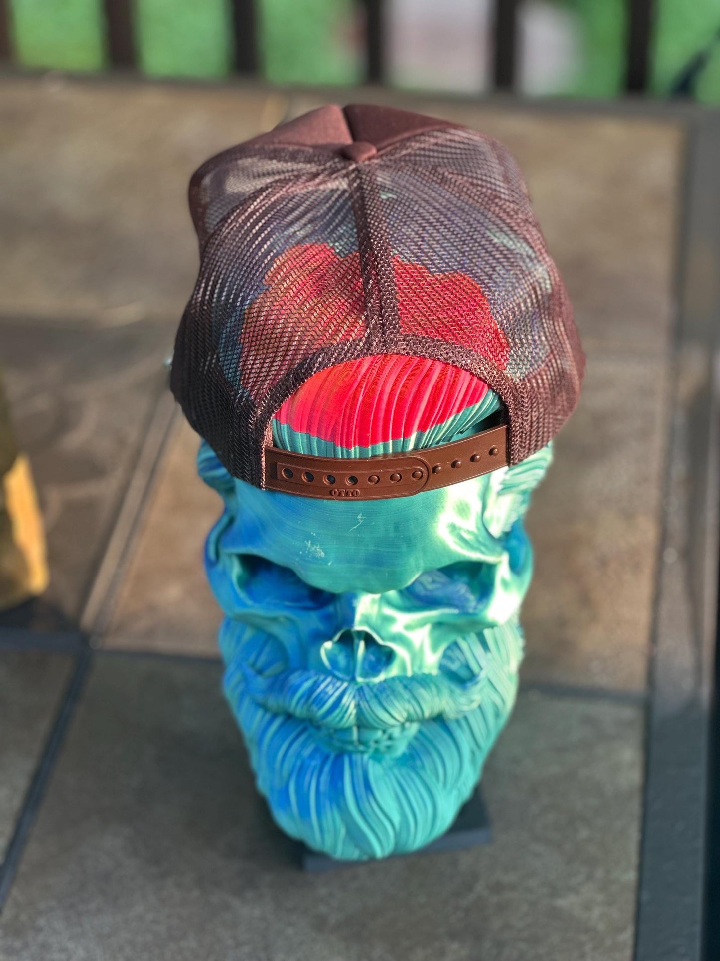 Brown “Do No Harm But Take No Bull” trucker hat with howdy hat chain, ornate teal rhinestones.
