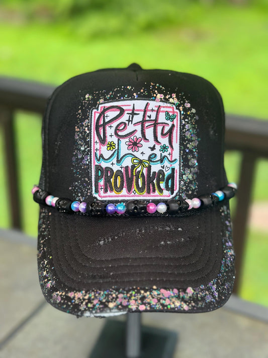 Petty When Provoked destructed black hand painted trucker hat.